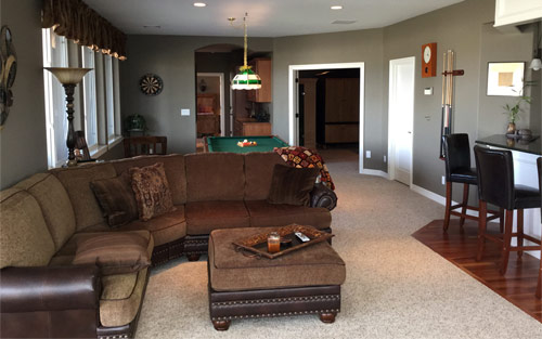 Basement remodel with new paint, carpet, hardwood floors and windows by Mountain View Corporation in Boulder Colorado