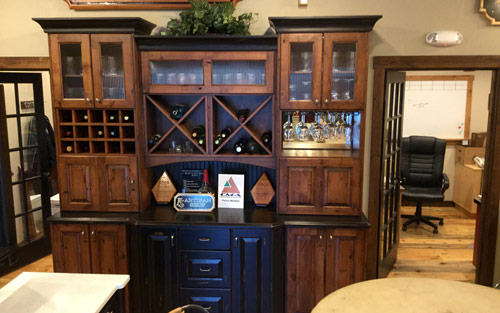 Goregous cutsom build liquor cabine with cherry wood for home kitchen in Colorado